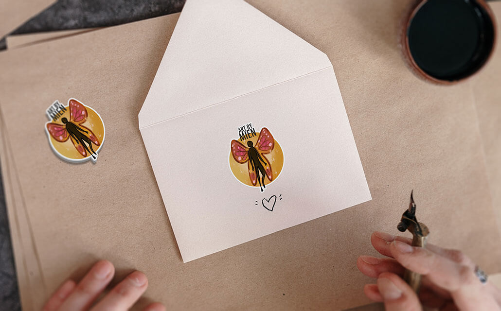 Art by mein logo sticker on an envelope.