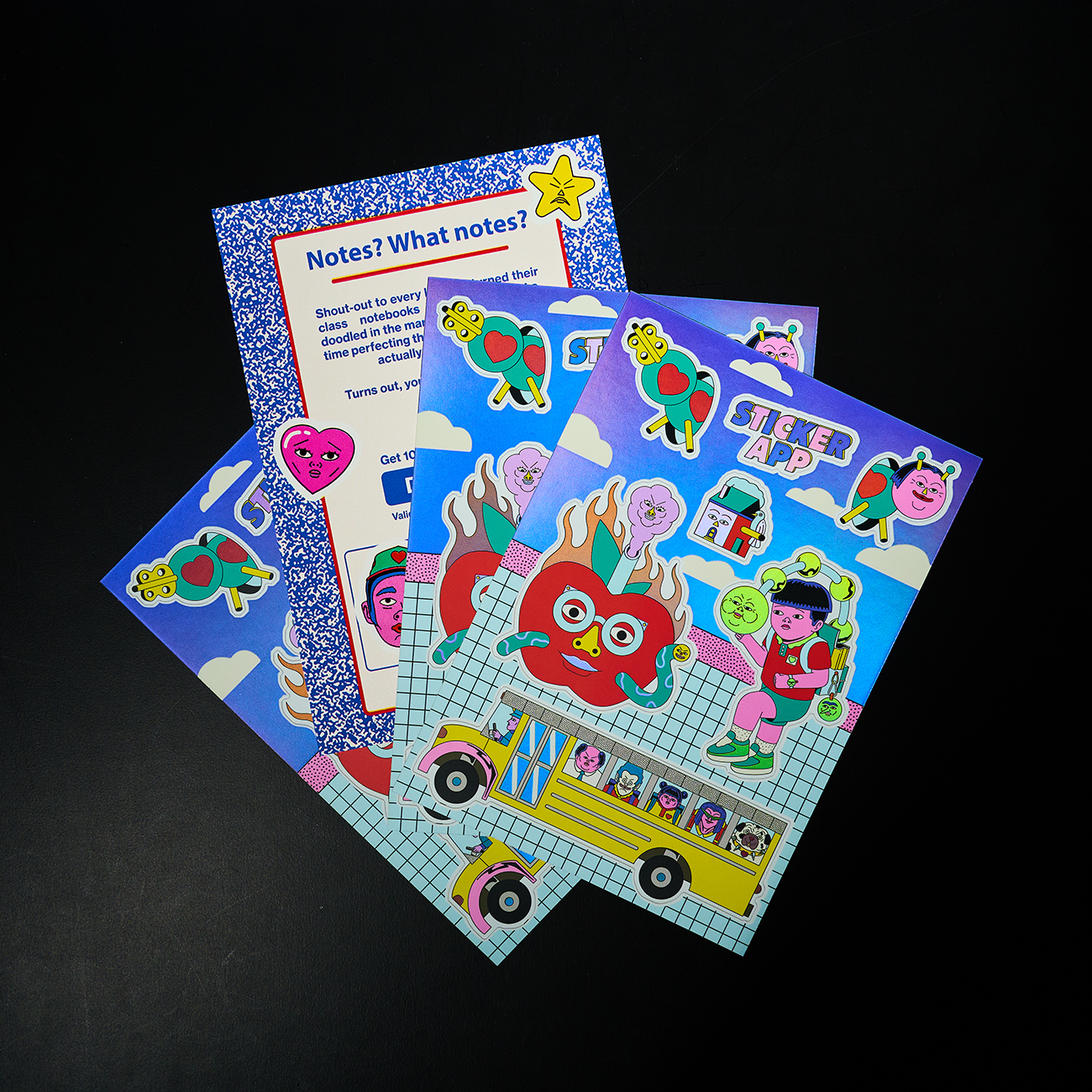sticker sheets with back paper print against a black background