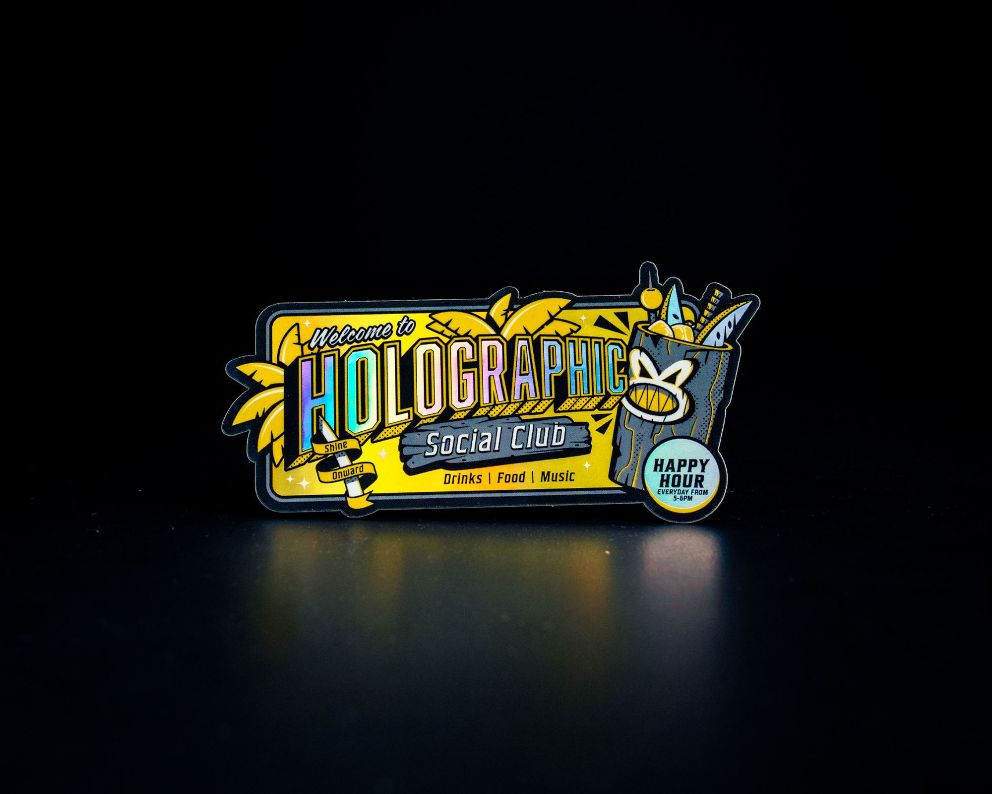 Colorful sticker for "Holographic Social Club," featuring tropical drinks and decor, with text promoting drinks, food, and music.