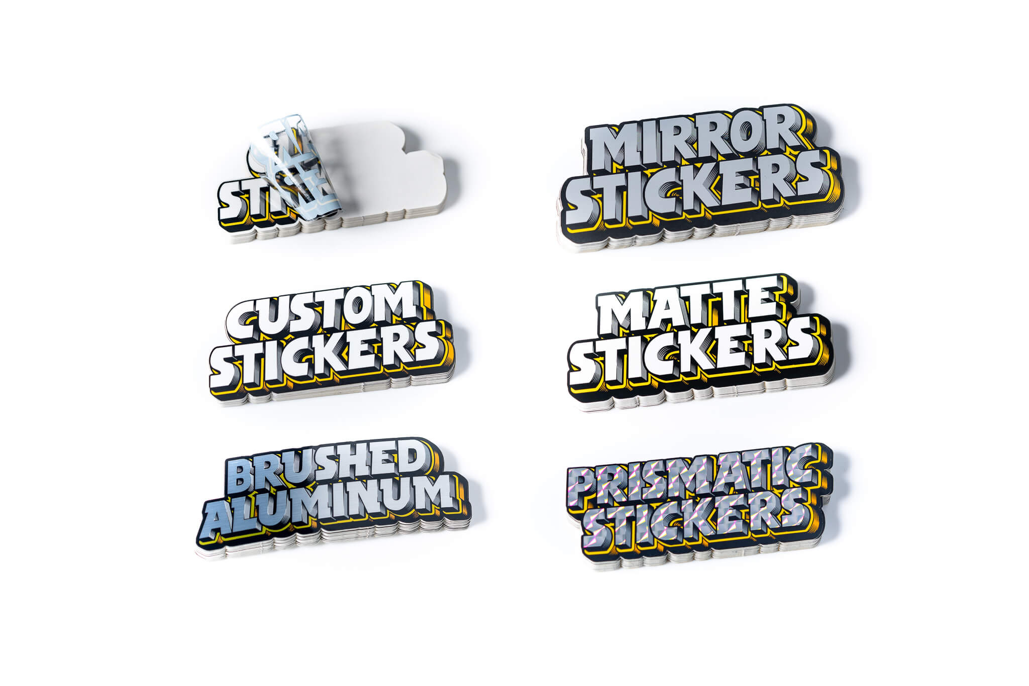 Six 3D text stickers on a white background: "Mirror Stickers," "Custom Stickers," "Matte Stickers," "Brushed Aluminum," and "Prismatic Stickers."