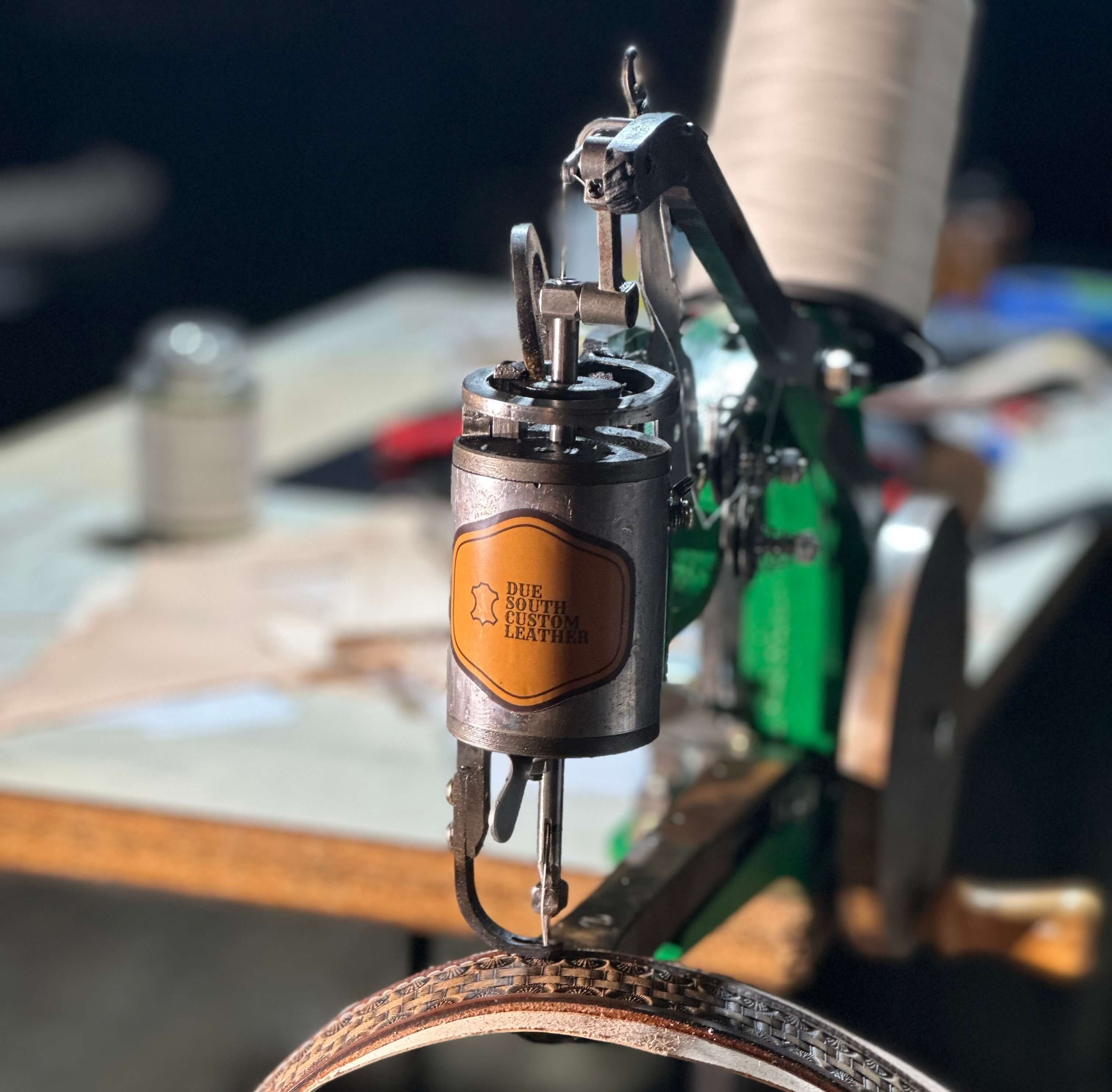 Heavy Duty sticker attached to a operating sewing machine.