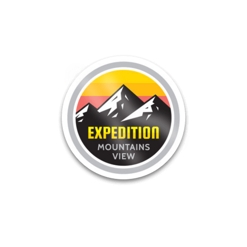 Circular Vinyl sticker logo with mountains, a yellow and red sky, and the words "Expedition Mountains View".