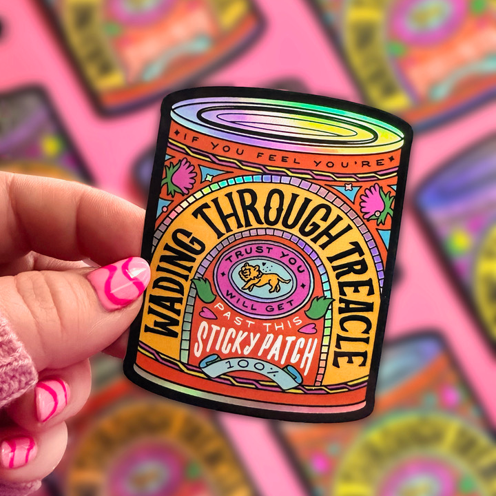 Die cut holographic sticker in the shape of a can with motivational qoute.